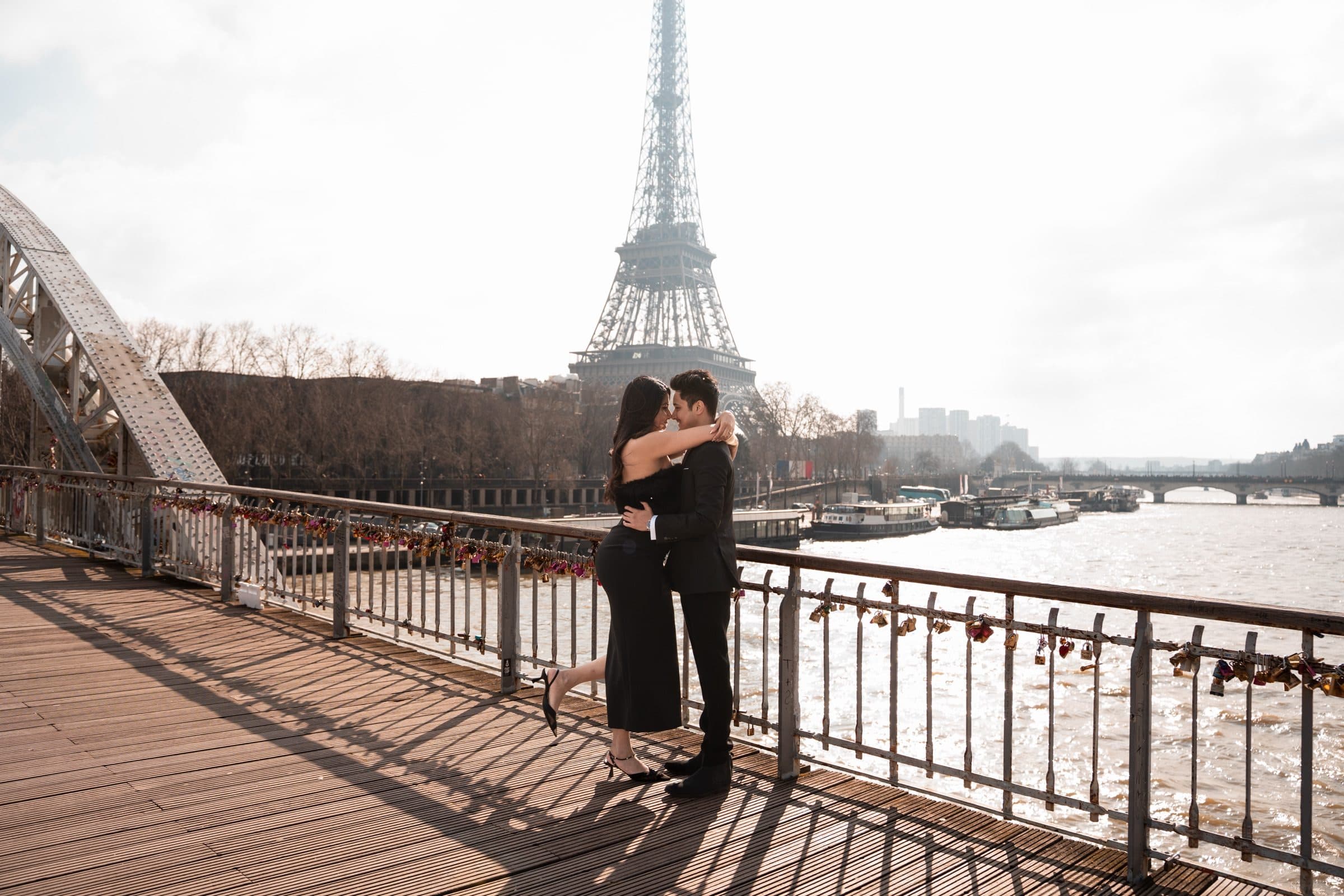 A couple photographed at the Eiffel Tower at golden hour