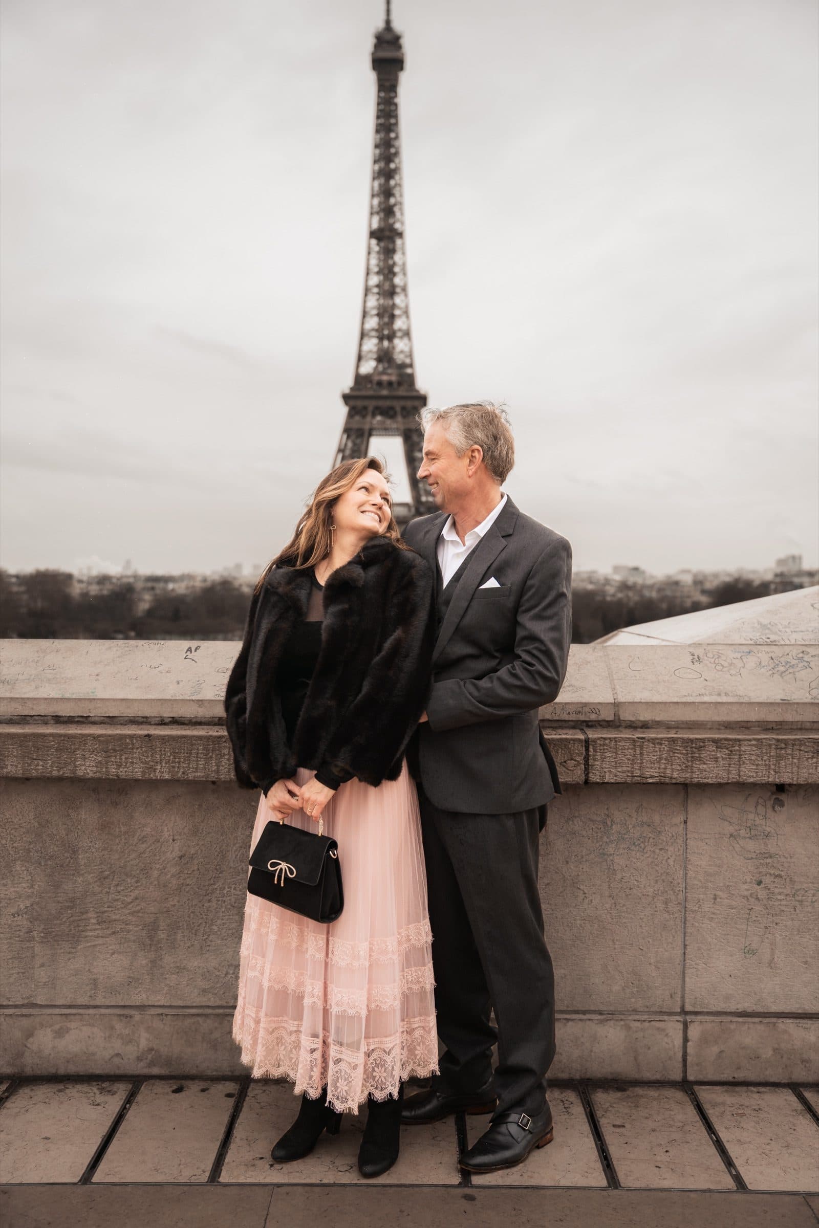 A couple photographed at Trocadéro at sunrise