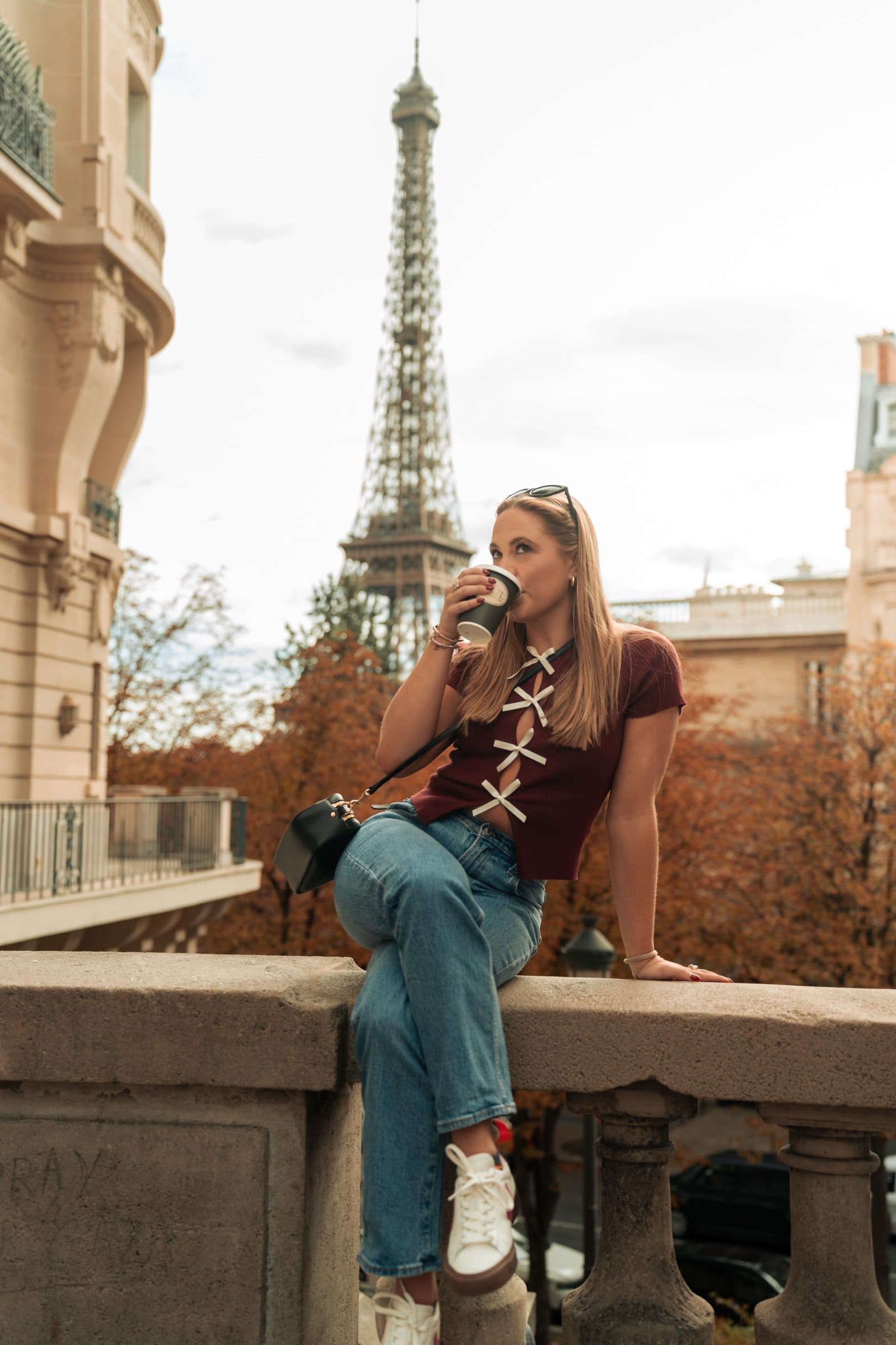 A solo traveller photographed at sunrise, on Avenue de Camoëns