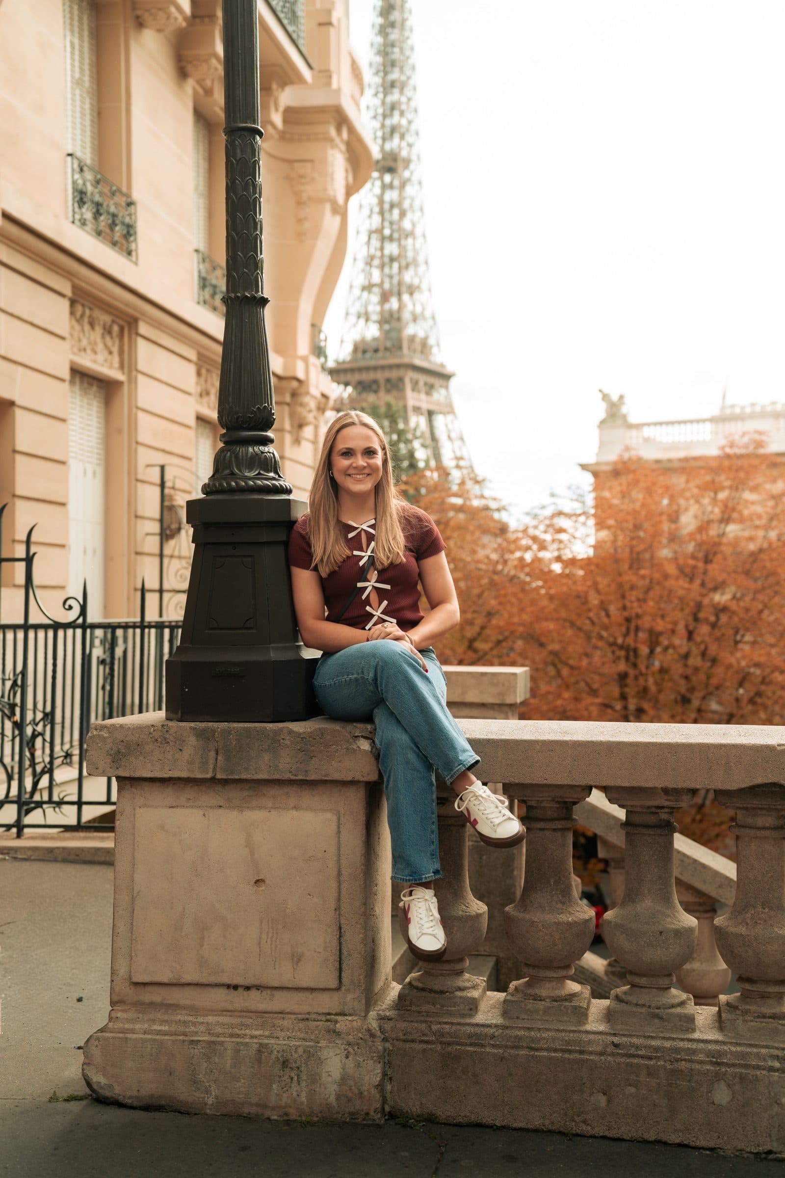 A solo traveller photographed at sunrise, on Avenue de Camoëns