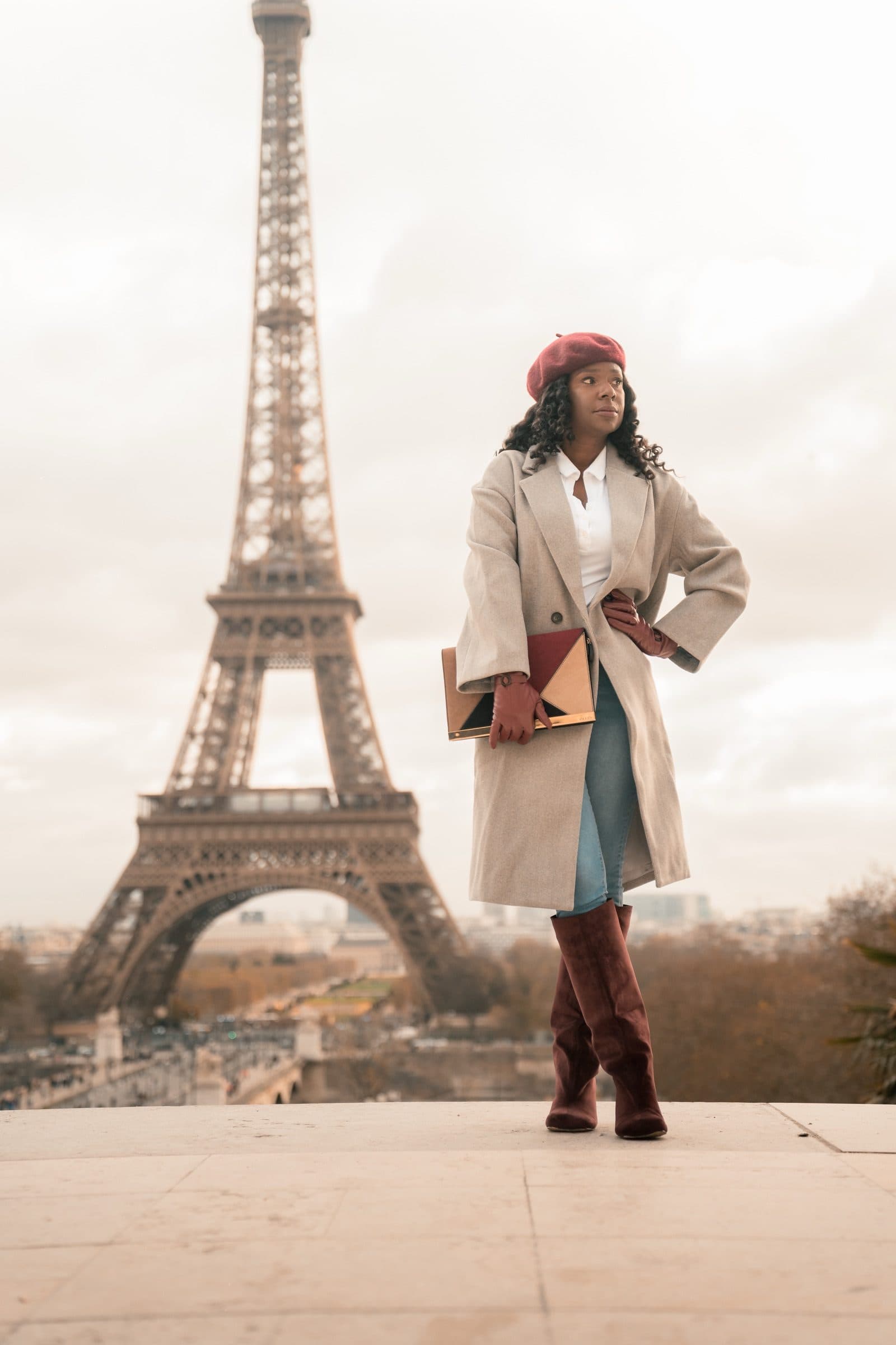 A solo traveller in portrait, at Trocadéro