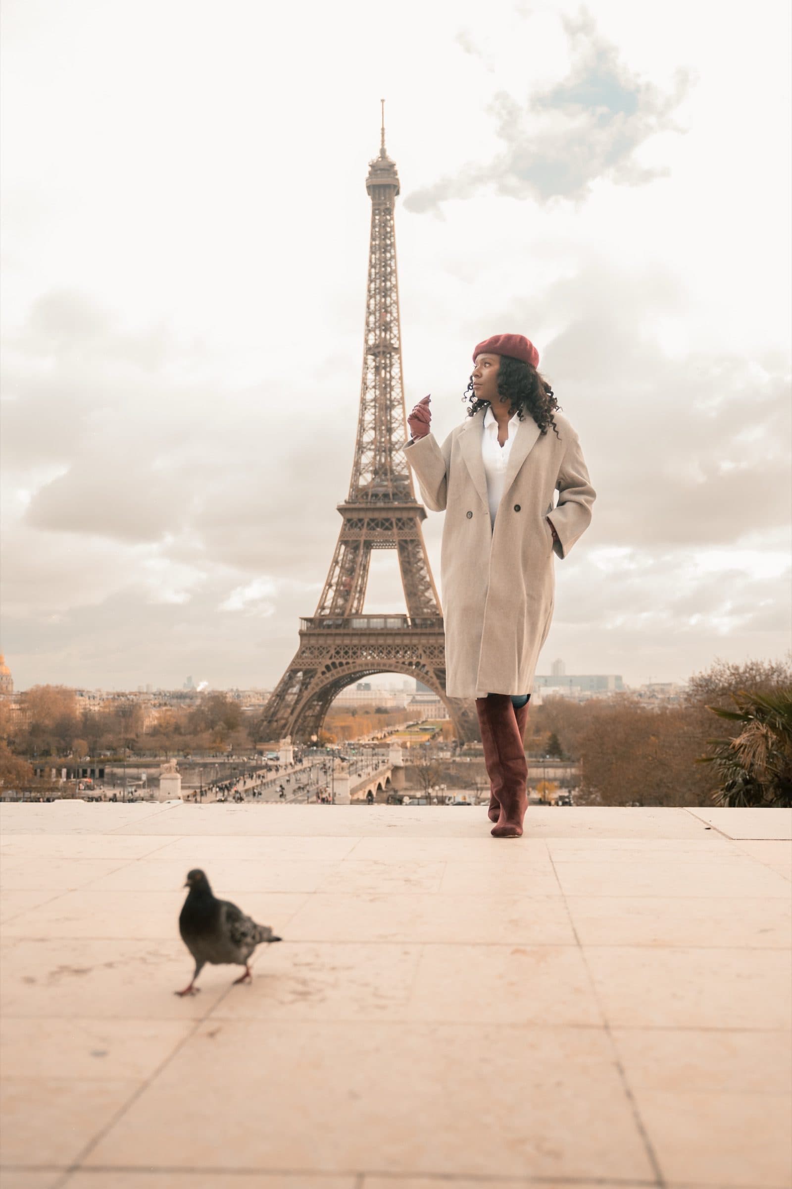 A solo traveller in portrait, at Trocadéro